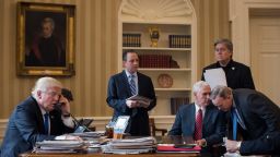 WASHINGTON, DC - JANUARY 28: President Donald Trump speaks on the phone with Russian President Vladimir Putin in the Oval Office of the White House, January 28, 2017 in Washington, DC. Also pictured, from left, White House Chief of Staff Reince Priebus, Vice President Mike Pence, White House Chief Strategist Steve Bannon, and Press Secretary Sean Spicer. On Saturday, President Trump is making several phone calls with world leaders from Japan, Germany, Russia, France and Australia. (Photo by Drew Angerer/Getty Images)