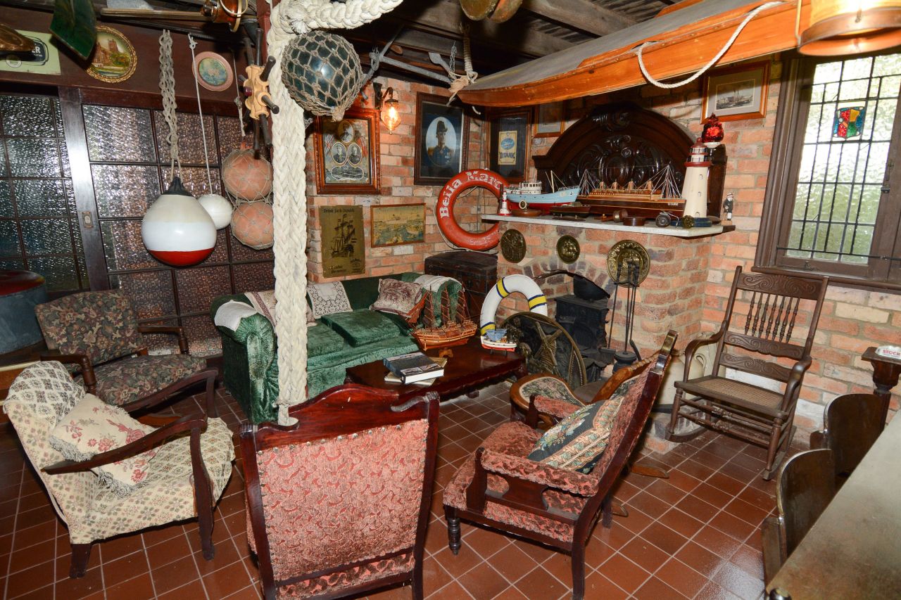 One corner of the room was devoted to sailing mementos, including buoys, life preservers and model ships. To complete the theme, a book about the Titanic sat on the table.