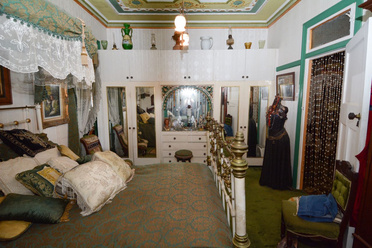 The MacGeorges fell in love with the house's painted ceilings -- white plaster in four of the rooms had been painted to complement the decor.