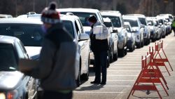 MILWAUKEE, WISCONSIN - NOVEMBER 17: Residents line up in their cars at a COVID-19 test center on the grounds of Miller Park on November 17, 2020 in Milwaukee, Wisconsin. Wisconsin recently reported a seven-day average COVID-19 positivity rate of nearly 40%. (Photo by Scott Olson/Getty Images)