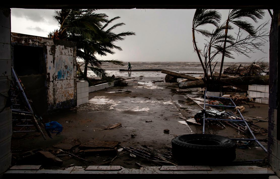 A man walks on the beach after the passage of Hurricane Iota in Bilwi, Nicaragua on November 17, 2020. 