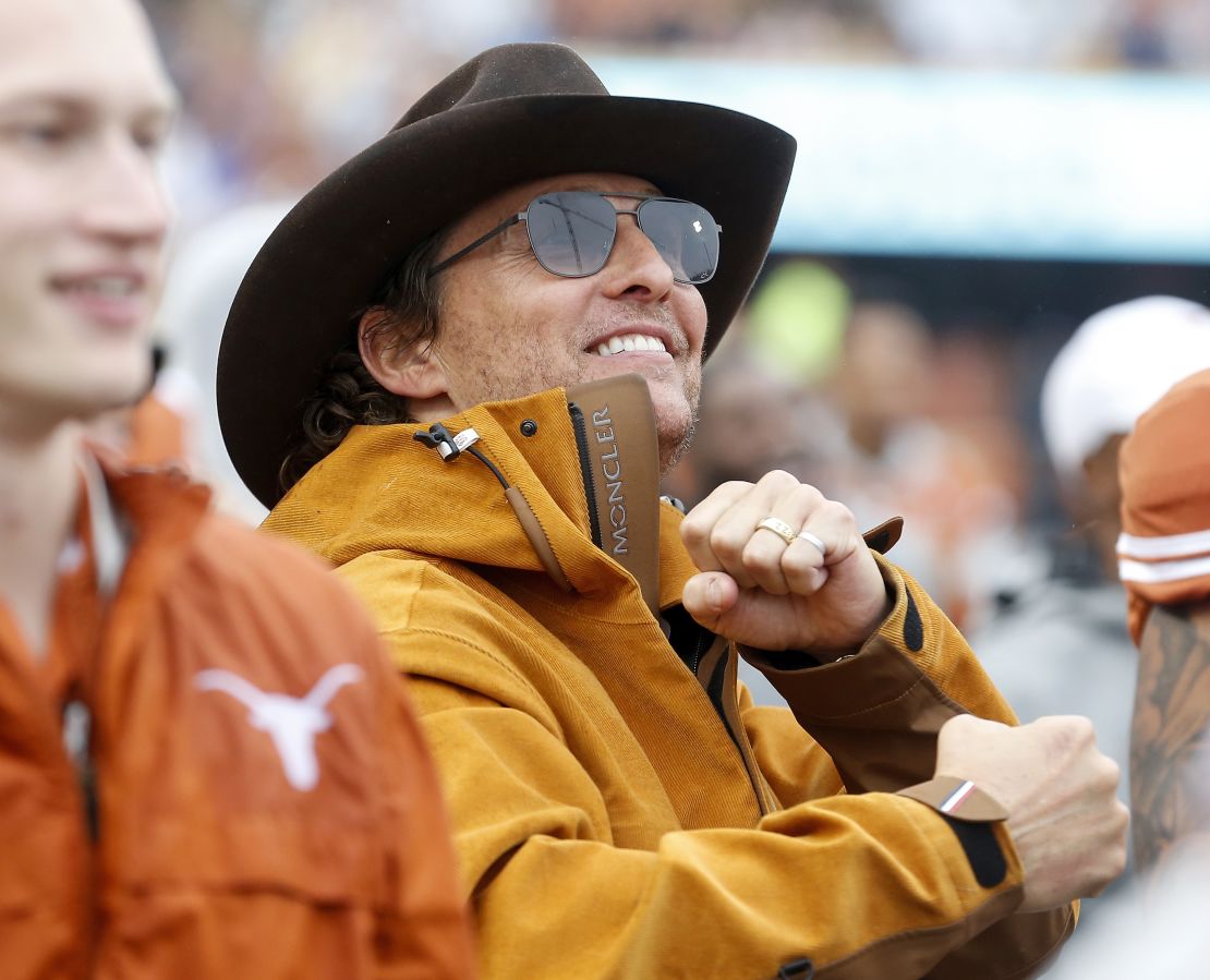McConaughey celebrates on the Texas Longhorns sideline in the second half against the Texas Tech Red Raiders at Darrell K Royal-Texas Memorial Stadium on November 29, 2019 in Austin, Texas.