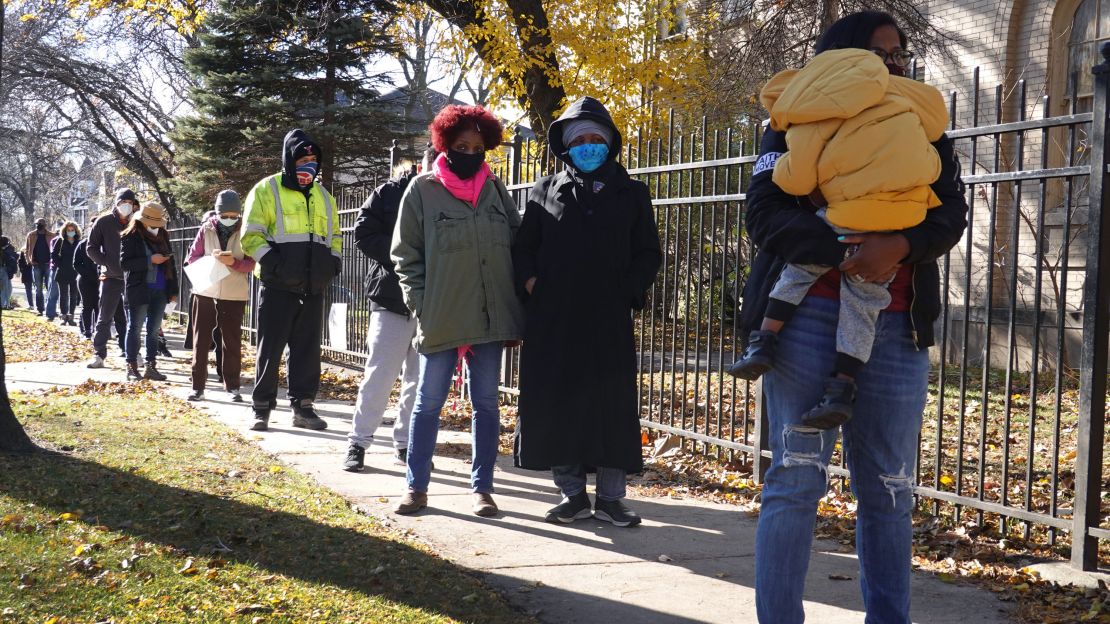 People wait in line for Covid-19 tests offered by the Community Organized Relief Effort, a non-profit organization in Chicago's Englewood neighborhood, on November 12.