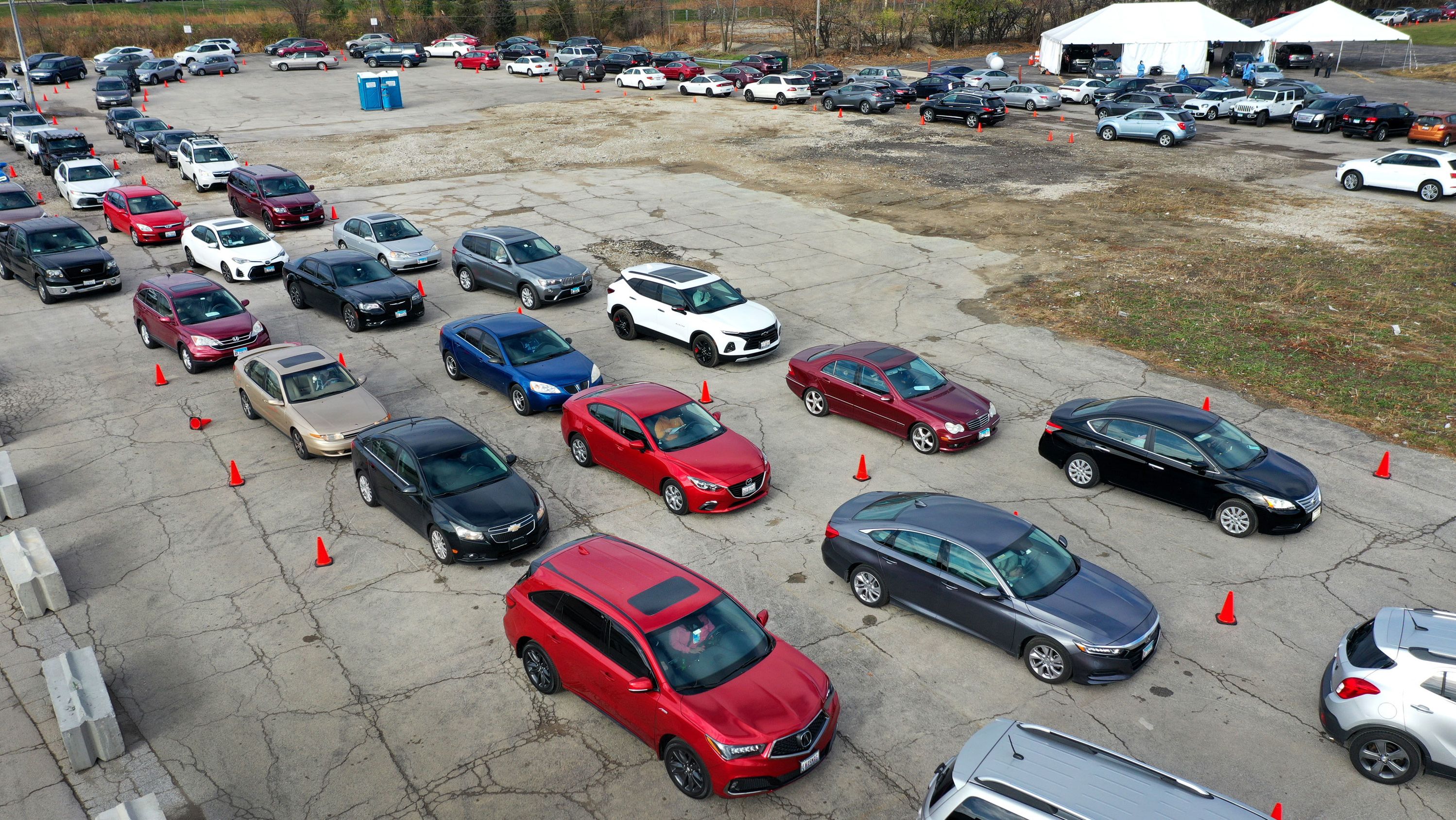 Motorists wait in line at a drive-up Covid-19 test site last week in Aurora, Illinois. 