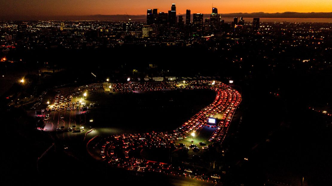 Motorists wait Wednesday in long lines to take a coronavirus test in a parking lot at Dodger Stadium in Los Angeles on November 18.