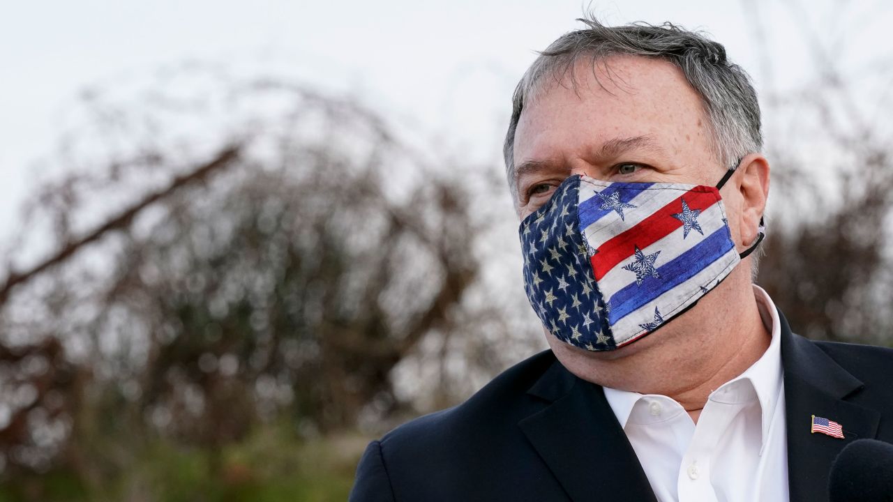 US Secretary of State Mike Pompeo listens as Israel's Foreign Minister Gabi Ashkenazi speaks in the Golan Heights, on November 19.