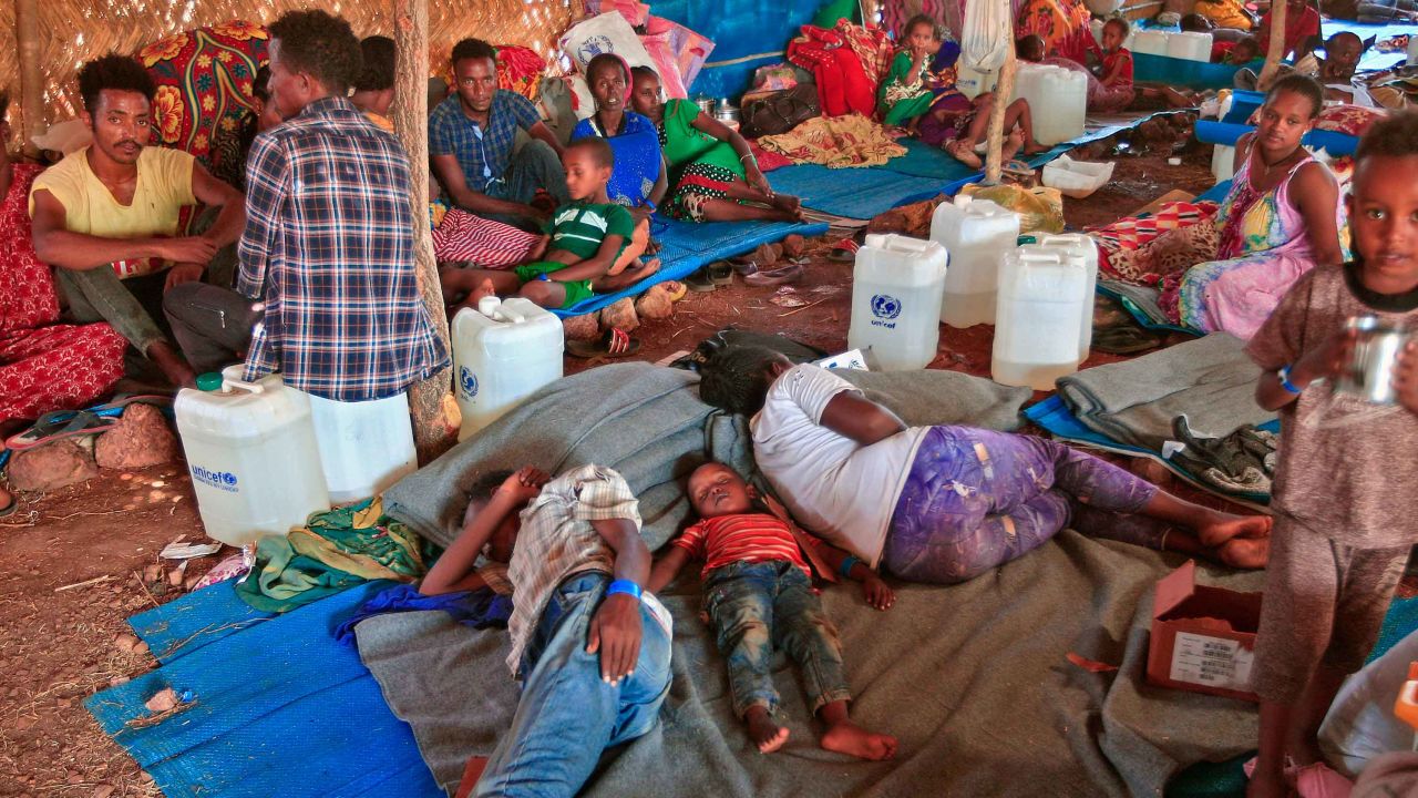 Ethiopian refugees who fled fighting in Tigray province lie in a hut at the Um Rakuba camp in Sudan's eastern Gedaref province, on November 18, 2020. 