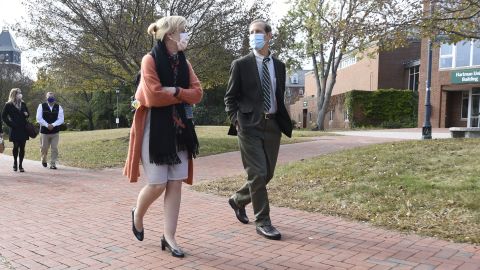 Deborah Birx walks on campus with her brother, Donald, the president of Plymouth State University.