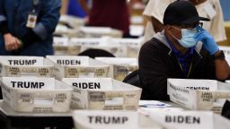 Cobb County Election official sort ballots during an audit, Friday, Nov. 13, 2020, in Marietta, Ga. (AP Photo/Mike Stewart)