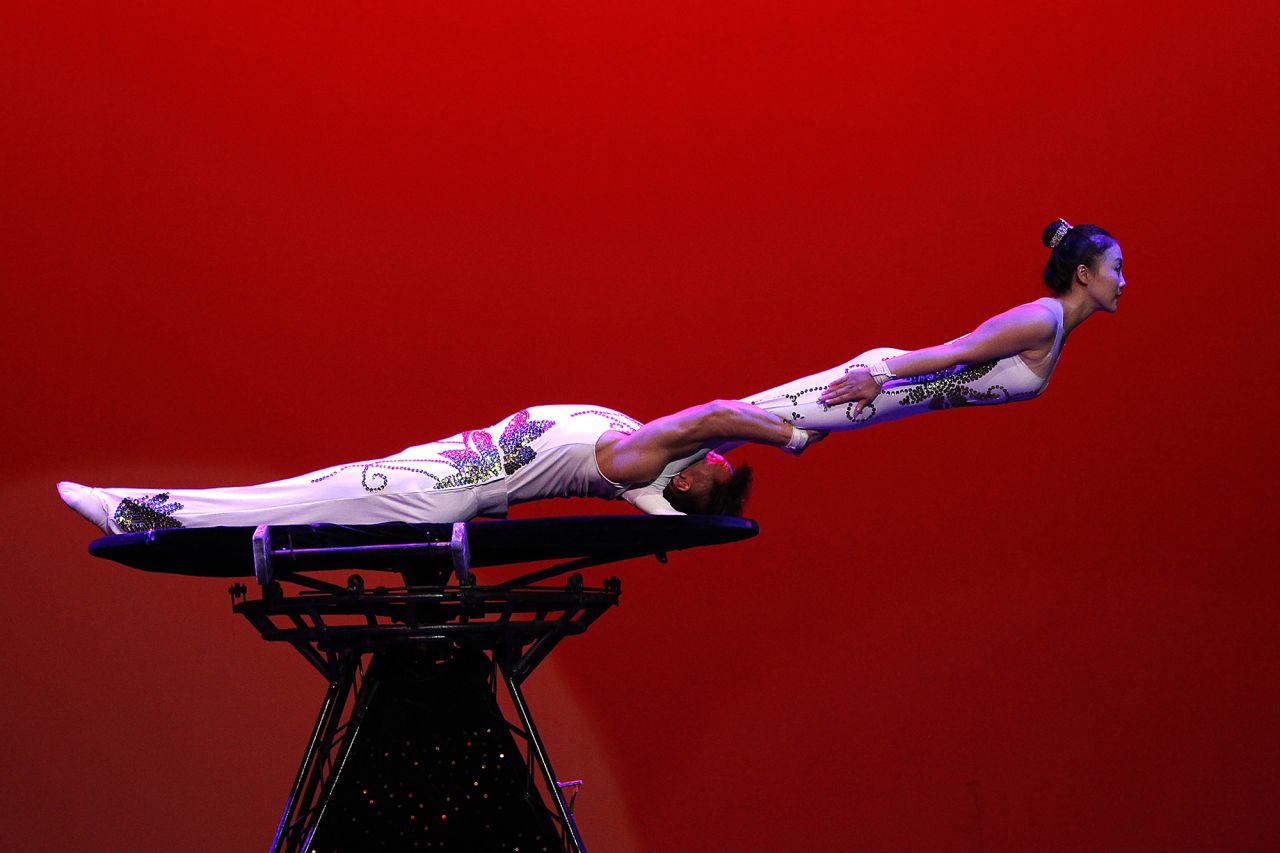 Gymnasts from the Pyongyang Circus Theater perform during Mother's Day in North Korea on Monday, November 16.