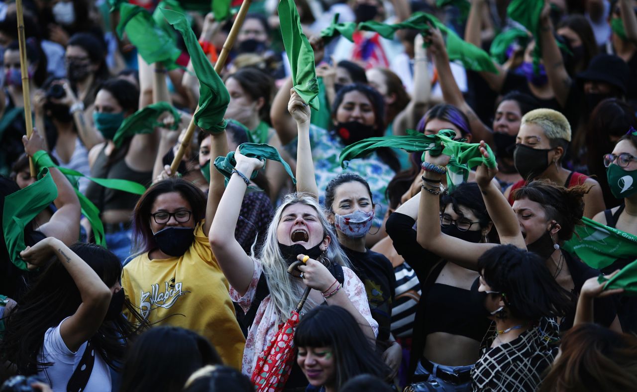 Pro-choice activists shout in front of the Congress of the Argentine Nation on Wednesday, November 18, in Buenos Aires. Argentina's President Alberto Fernández presented a bill to decriminalize and legalize abortion in Argentina.