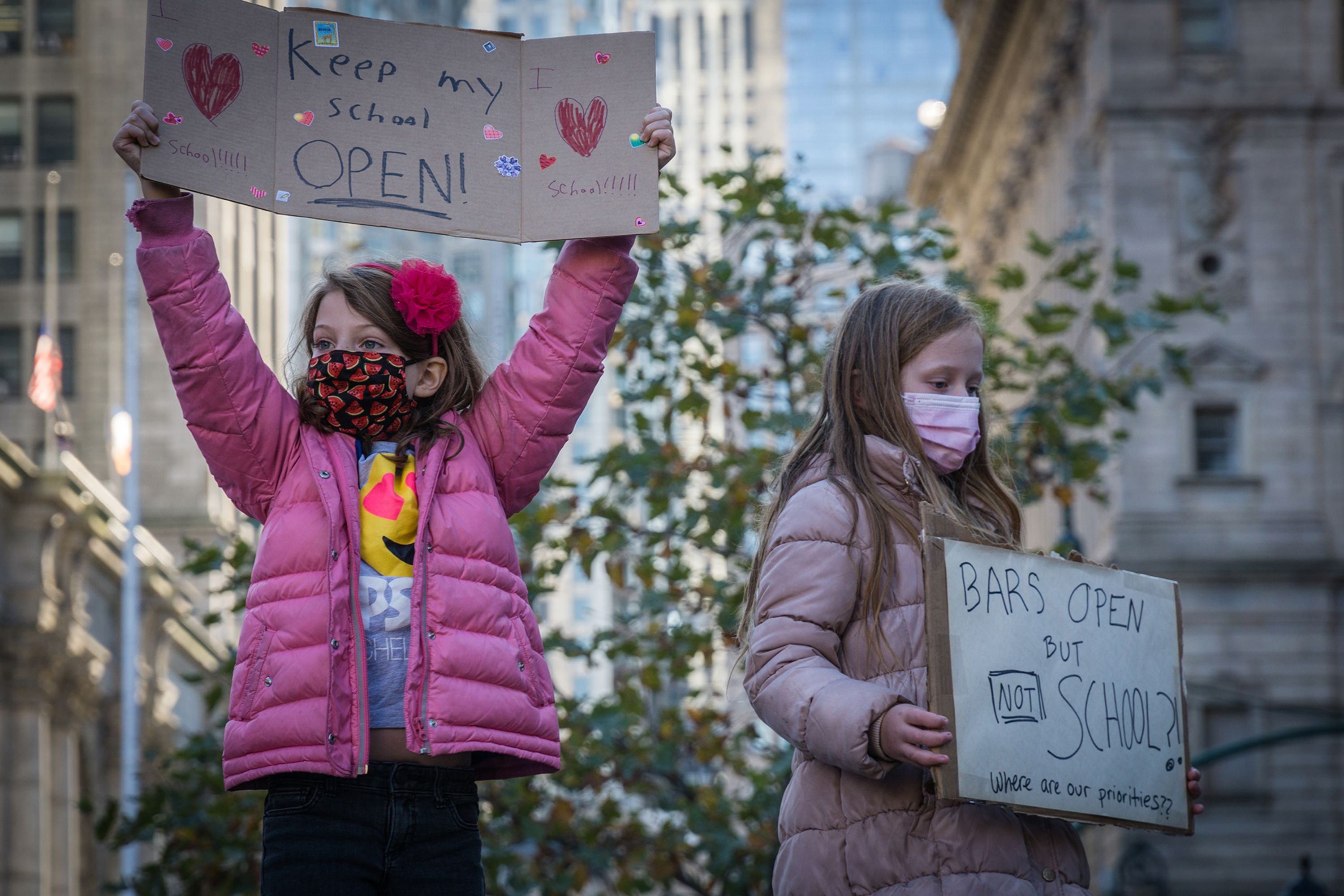 New York City students protest to keep schools open on November 14. Mayor Bill de Blasio made the decision to close down the city's public school buildings starting on November 19, after the city's 7-day average reached the 3% positive-testing-rate threshold.