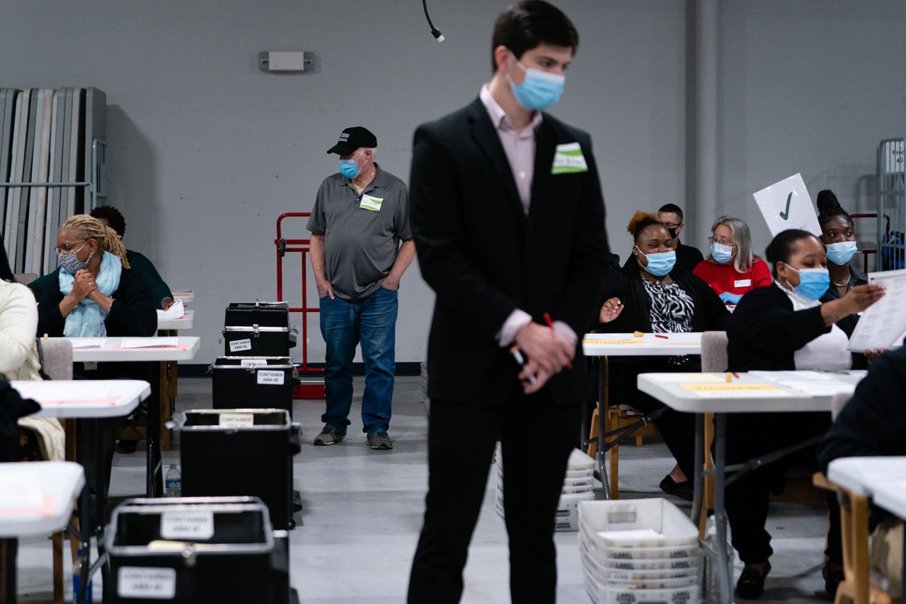 Poll watchers monitor people hand counting 2020 presidential election ballots during an audit at the Gwinnett County Voter Registration Office in Lawrenceville, Georgia, on Friday, November 13. <a href="https://www.cnn.com/2020/11/19/politics/georgia-recount-election-results/index.html" target="_blank">Georgia finished its statewide audit</a> of the razor-thin presidential race, confirming that President-elect Joe Biden defeated President Donald Trump, according to a news release from the Secretary of State's Office.