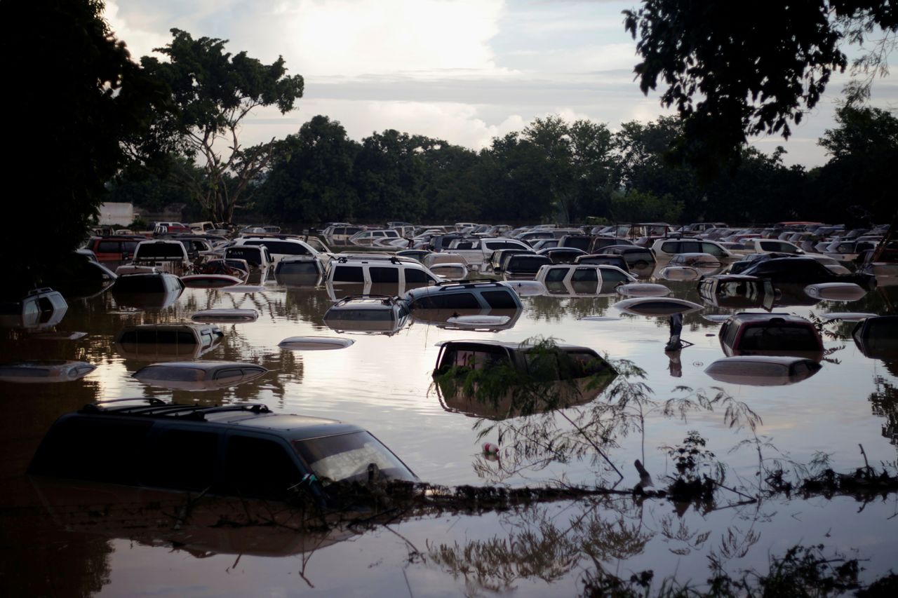 Submerged vehicles in the Chamelecon River after flooding from <a href="https://www.cnn.com/2020/11/18/weather/tropical-storm-iota-wednesday/index.html" target="_blank">Storm Iota</a> in La Lima, Honduras, on Thursday, November 19. The 2020 Atlantic hurricane season has been historically active, with Iota bringing the season's count to 30 named storms, the most ever.