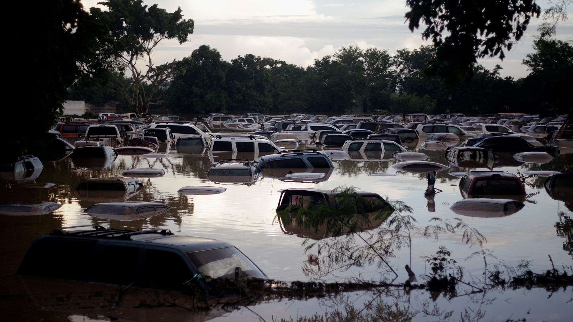 Vehicles submerged after heavy rain caused by Storm Iota, in La Lima, Honduras on November 19, 2020.