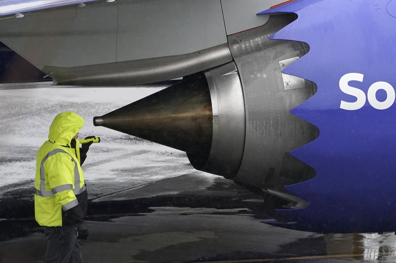 A worker inspects an engine on a <a href="https://www.cnn.com/2020/11/18/business/boeing-737-max-approval/index.html" target="_blank">Boeing 737 Max 8 </a>built for Southwest Airlines at Renton Municipal Airport in Washington on Wednesday, November 18. The Federal Aviation Administration issued an order Wednesday that paved the way for the troubled Boeing 737 Max to carry passengers again, ending the jet's 20-month grounding.