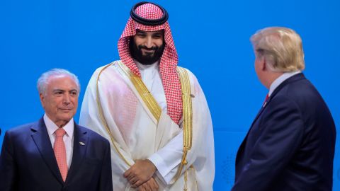 Brazil's then President Michel Temer, Saudi Arabia's Crown Prince Mohammed bin Salman and US President Donald Trump line up for the family photo during the G20 leaders' summit in Buenos Aires, on November 30, 2018. 