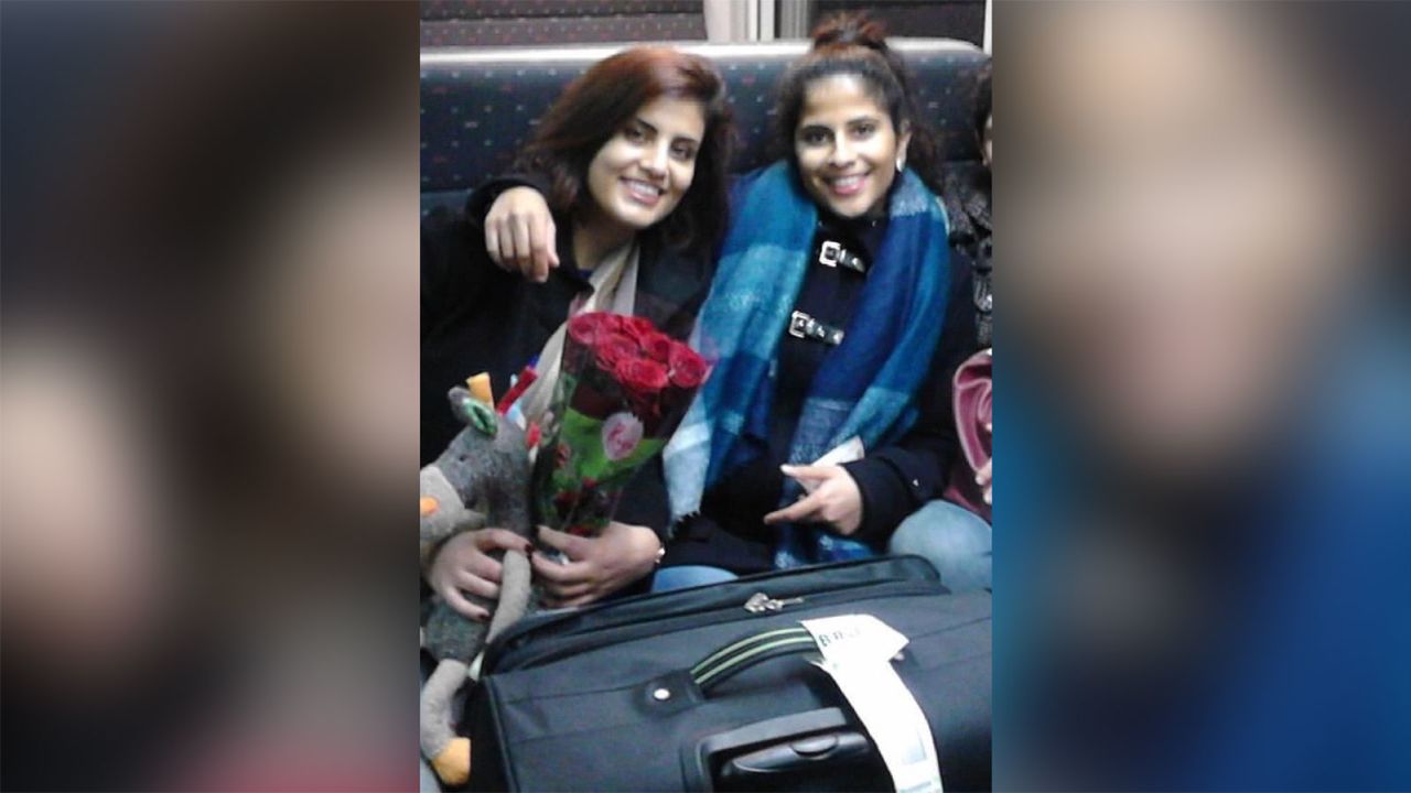 Lina al-Hathloul and her sister Loujain pictured in an undated photo on a train from Brussels. 