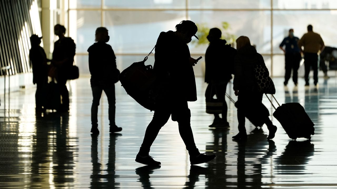 Passengers walk through Salt Lake City International Airport on October 27, 2020 in Salt Lake City.