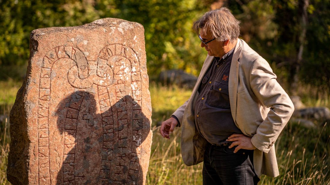 <strong>Norse code: </strong>Researcher Magnus Källström of the Swedish National Heritage Board reviews a runestone. The stones, he says, reveal surprising truths about Sweden's ancestors and their relationship with Christianity.