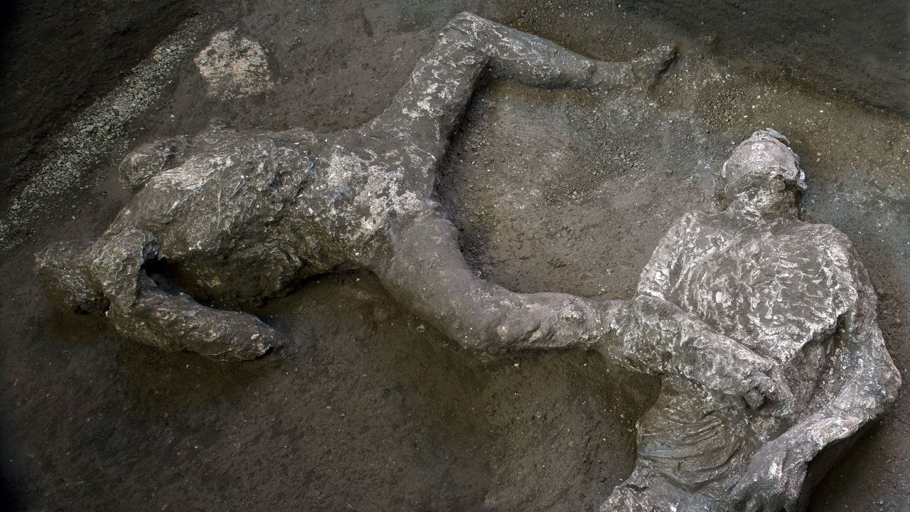 The casts of what are believed to have been a rich man and his male slave fleeing the volcanic eruption of Vesuvius nearly 2,000 years ago.