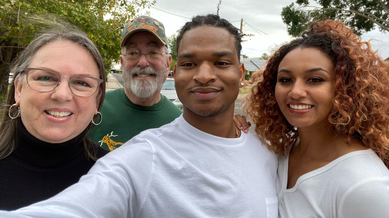 From left, Wanda Dench, her husband Lonnie Dench, Jamal Hinton and his girlfriend Mikaela Autumn.