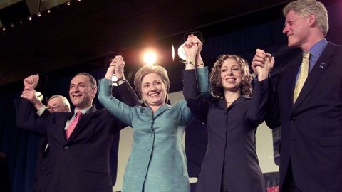 First Lady Hillary Rodham Clinton celebrates her US Senate election victory with President Bill Clinton, daughter Chelsea and Senator Charles Schumer on November 7, 2000.
