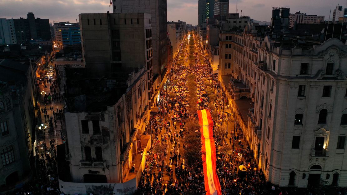 People refusing to recognize Peru's new government gather to protest in Lima on Saturday, November 14.