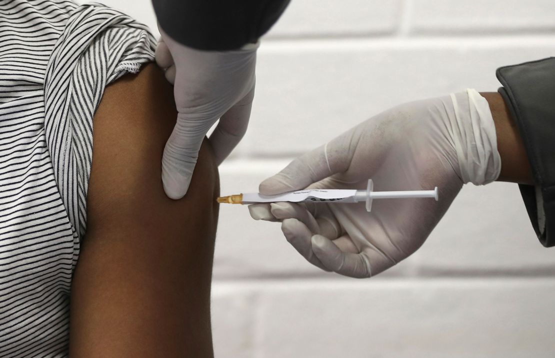 A volunteer receives an injection at the Chris Hani Baragwanath hospital on the outskirts of Johannesburg, on June 24 as part of South Africa's first participation in an Oxford/AstraZeneca vaccine trial. 