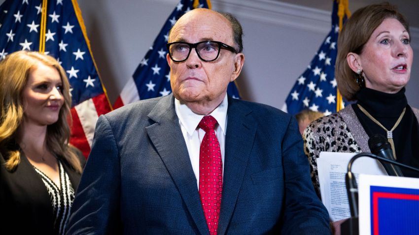 UNITED STATES - NOVEMBER 19: Rudolph Giuliani, attorney for President Donald Trump, conducts a news conference at the Republican National Committee on lawsuits regarding the outcome of the 2020 presidential election on Thursday, November 19, 2020. Trump attorneys Jenna Ellis, left,and Sydney Powell, also appear. (Photo By Tom Williams/CQ-Roll Call, Inc via Getty Images)
