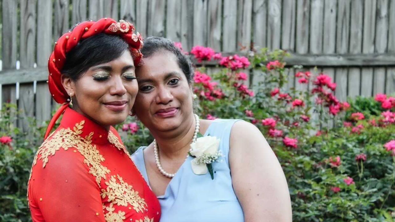 The author and bride (left) on her wedding day, with her mother, Melinda Trammell (right).