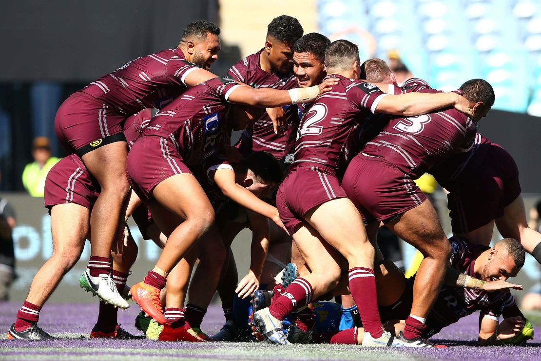 The Sea Eagles celebrate Titmuss' try that sealed victory against the Parramatta Eels in the 2017 NYC Grand Final. 