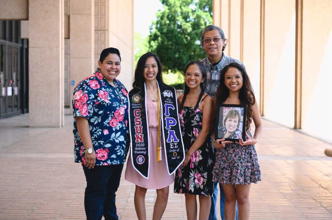 When Tiffany Olega graduated from college in May, her mom wasn't there to celebrate. Intead, her family posed with a framed photo of her. Rosary Castro-Olega, a nurse, died in March after contracting coronavirus. 