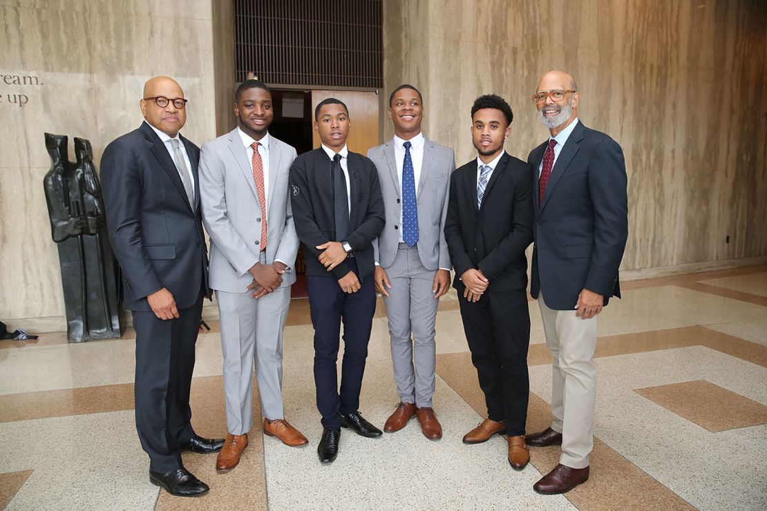 United Negro College Fund President and CEO Dr. Michael Lomax (right) and Morehouse University President David A. Thomas (left) with Morehouse students in 2018.