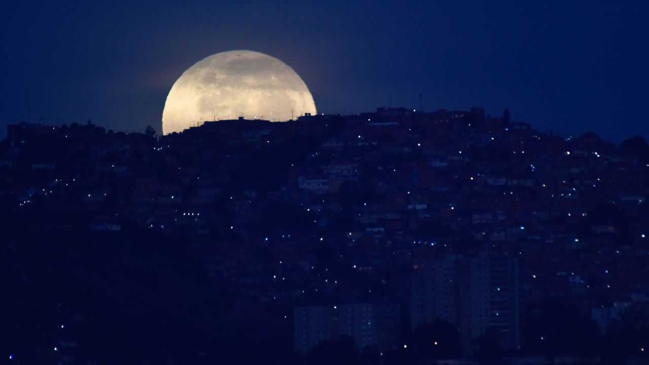 <strong>Caracas:</strong> The ''blue moon" -- the second full moon of a calendar month -- is seen over the Venezuelan capital. 