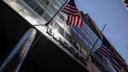 American flags fly outside BlackRock Inc. headquarters in New York, U.S, on on Thursday, July 9, 2020. BlackRock is scheduled to release earnings figures on July 17. Photographer: Jeenah Moon/Bloomberg via Getty Images