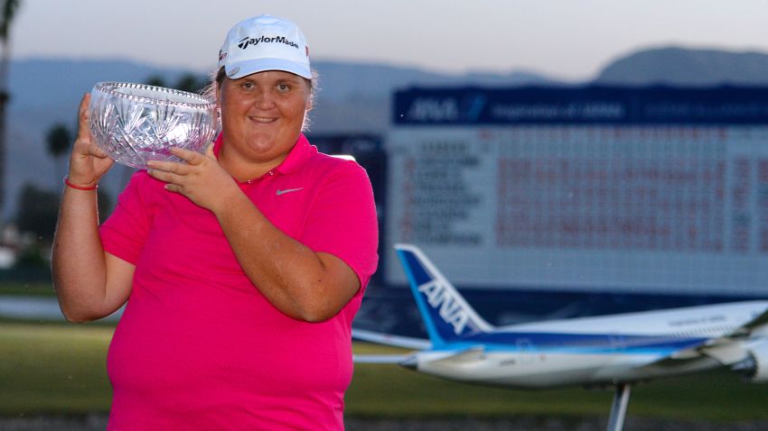RANCHO MIRAGE, CA - APRIL 05: Haley Moore lifts the leading amateur trophy after the final round of the ANA Inspiration on the Dinah Shore Tournament Course at Mission Hills Country Club on April 5, 2015 in Rancho Mirage, California. (Photo by Robert Laberge/Getty Images)