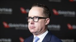 Alan Joyce, chief executive officer of Qantas Airways Ltd., listens during a Bloomberg Television interview in Sydney, Australia, on Thursday, Feb. 20, 2020. Qantas is slashing flights in Asia and freezing recruitment in response to falling demand as the coronavirus scares travelers across the region. Photographer:  Brent Lewin/Bloomberg via Getty Images