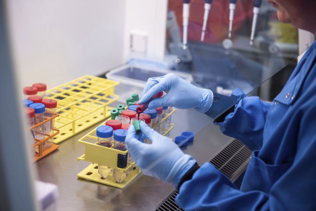 A researcher in a laboratory at the Jenner Institute in Oxford, England, works on the coronavirus vaccine developed by AstraZeneca and Oxford University.