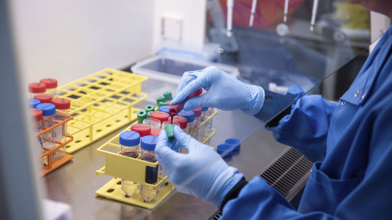 A researcher in a laboratory at the Jenner Institute in Oxford, England, works on the coronavirus vaccine developed by AstraZeneca and Oxford University.