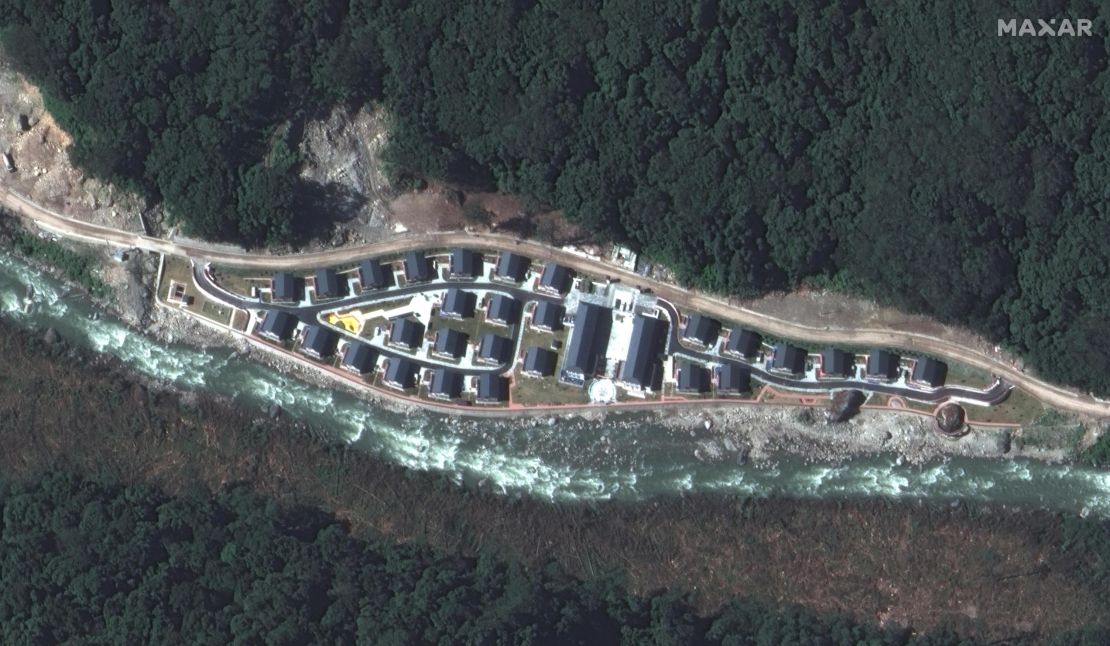 Satellite imagery of the Chinese village of Pangda, provided by Maxar Technologies. The firm claims the village was built on the Bhutanese side of a disputed border with China. 