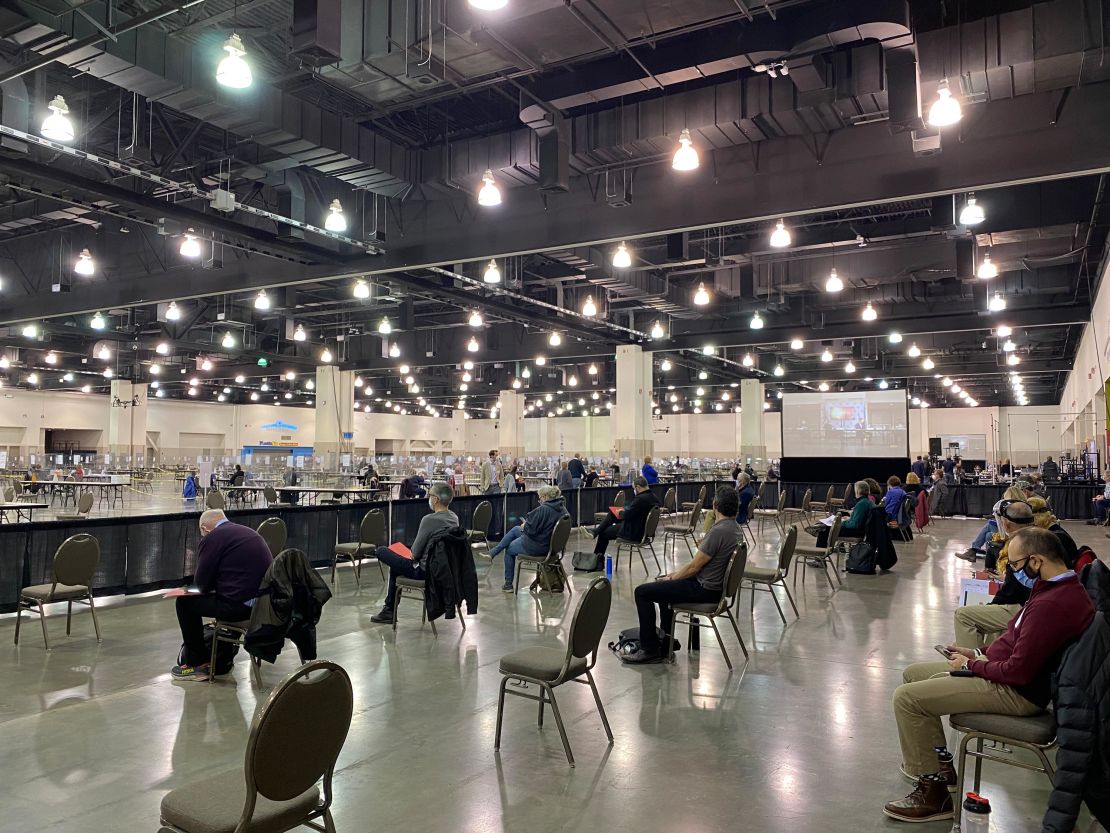 Observers wait to be called to counting tables for Milwaukee County's recount.