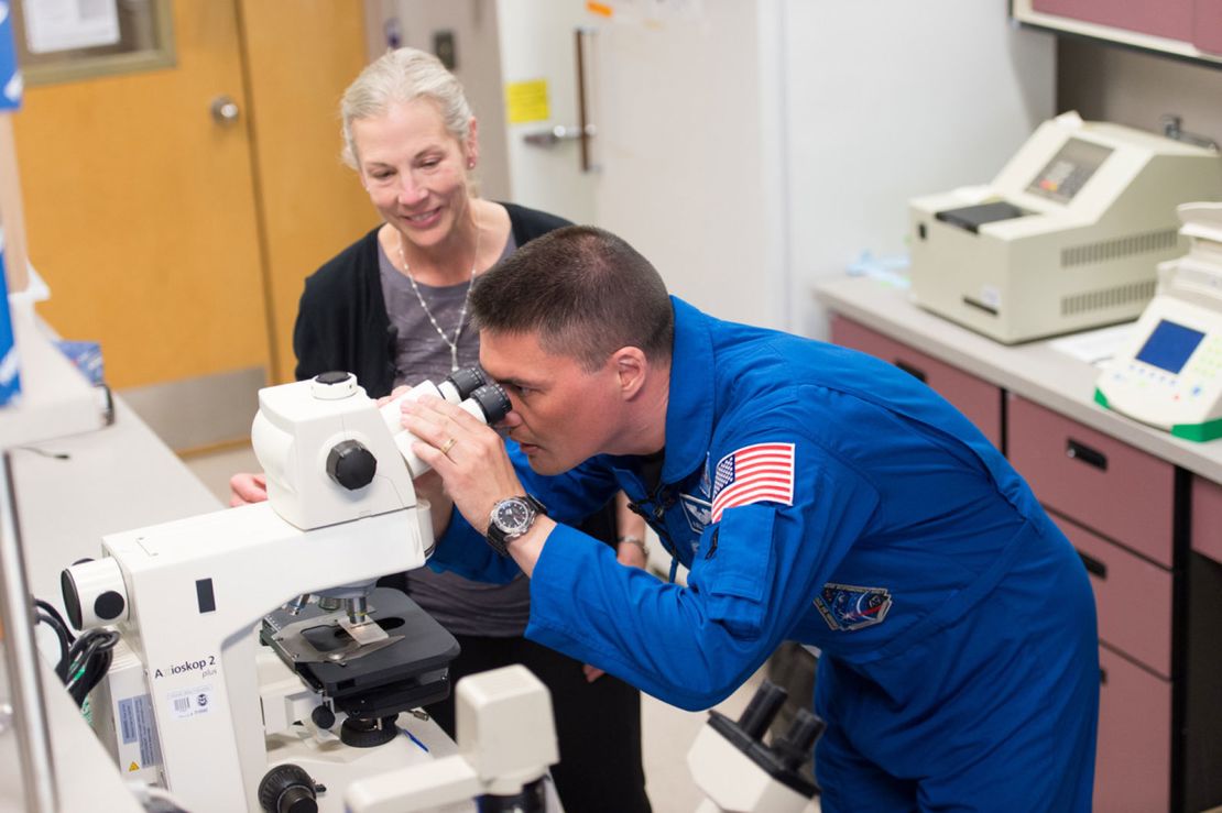 Colorado State University professor Susan Bailey and NASA astronaut Kjell Lindgren are pictured during a visit to Bailey's lab in 2016. 