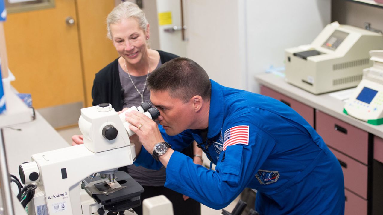 Colorado State University professor Susan Bailey and NASA astronaut Kjell Lindgren are pictured during a visit to Bailey's lab in 2016. 