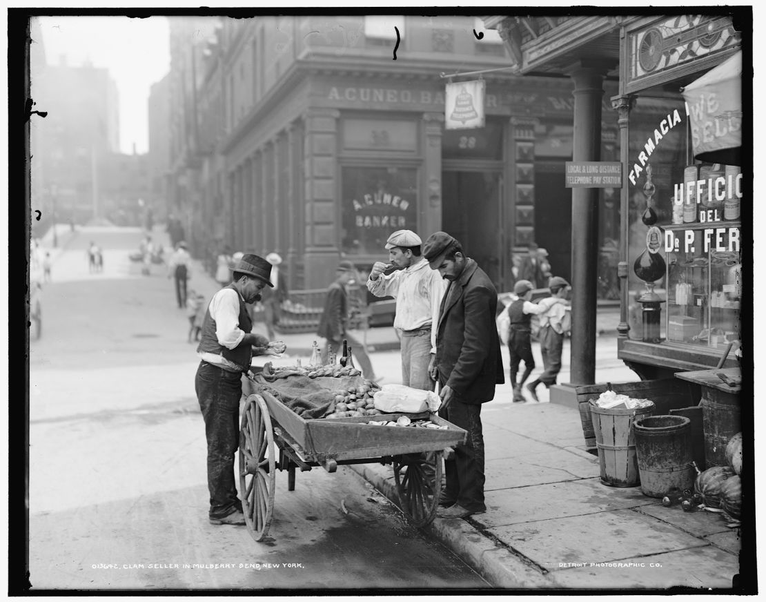 A clam seller in Mulberry Bend, New York, circa 1900. Clams and oysters were cheap and filling and were often sold by African Americans. 