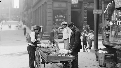 A clam seller in Mulberry Bend, New York, circa 1900. Clams and oysters were cheap and filling and were often sold by African Americans. 