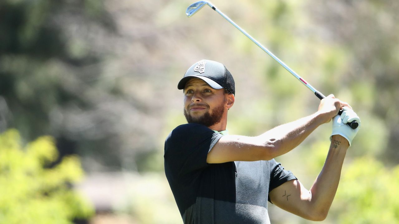 Curry plays a tee shot on the ninth hole during round two of the American Century Championship.