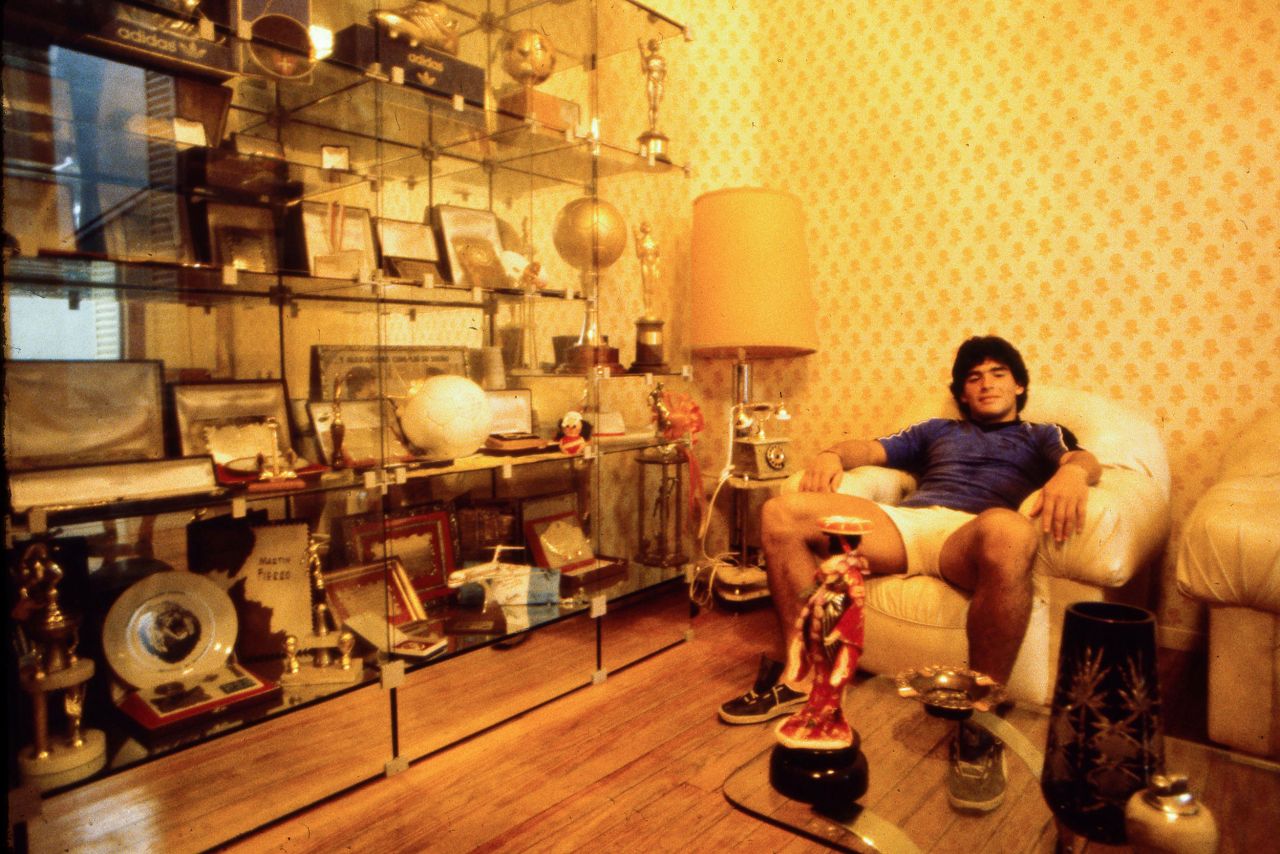 Maradona sits at his home in Buenos Aires in 1980. From the earliest days of his career, he was known as "El Pibe de Oro" ("The Golden Boy").