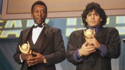 FILE - In this March 1987 file photo, Pele, left, and Maradona hold "Sports Oscar" trophies in Milan, Rome. The Argentine soccer great who was among the best players ever and who led his country to the 1986 World Cup title before later struggling with cocaine use and obesity, died from a heart attack on Wednesday, Nov. 25, 2020, at his home in Buenos Aires. He was 60. (AP Photo/File)