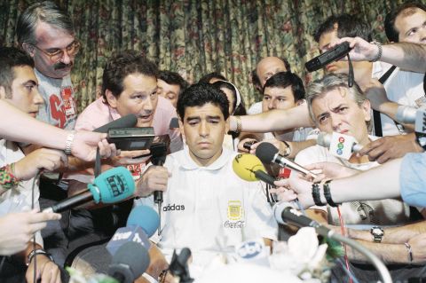 Maradona addresses the media after Argentina dropped him from the 1994 World Cup team. Just hours before the team's final first-round game, it was revealed that he had tested positive for the use of ephedrine, a banned stimulant. In 1991, Maradona tested positive for cocaine use and was banned for the sport for 15 months.